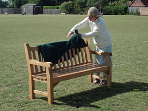 Judy unveils the Stephen Saunders Memorial Bench. Picture by Jim Brearley