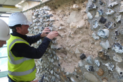 Detailed inspection of the outside of the tower shows that many different materials have been used to point between the flints externally. Cement pointing is “bad” as it stops the water inside the tower from escaping, and it damages the softer lime mix used internally. Unfortunately cement has been found all over the tower