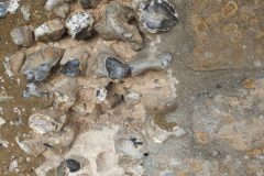 Detailed inspection of the outside of the tower shows that many different materials have been used to point between the flints externally. Cement pointing is “bad” as it stops the water inside the tower from escaping, and it damages the softer lime mix used internally. Unfortunately cement has been found all over the tower