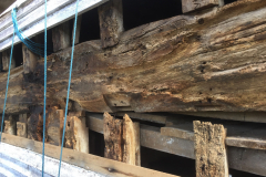Uprights parted from the side girt